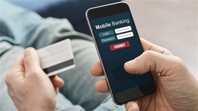 سداد الفواتير والتقديم على قرض.. اعرف خدمات الأونلاين من البنك الأهلي الكويتي