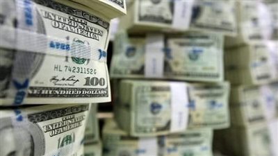 إنهيار العملة الإيرانية.. 1 دولار أمريكي= 447 ألف ريال إيراني بالسوق السوداء